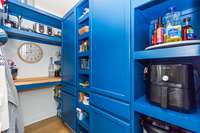 This walk-in pantry is the perfect spot to keep everything organized and within reach!