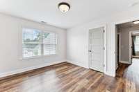 Upstairs Bedroom 2 to left of stairs with walk in closet