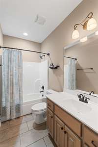 Second full bath with shower/tub combo.