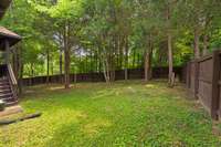 Mature trees in the backyard for added privacy and shade.
