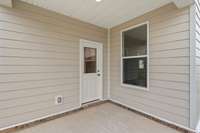 Covered Back Patio; included with the Murray floor plan! Photo is of a completed home; not the subject property.