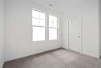 Photo is of a model. Not the subject property.