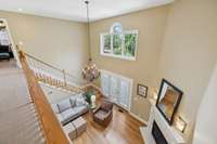 A  gorgeous overlook of the living room below, showcasing the soaring cathedral ceilings and expansive windows. 2640 Chesterfield Ct. Murfreesboro, TN 37129