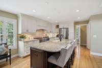 At the center of the kitchen sits a spacious island with barstool seating, perfect for casual dining or entertaining. 2640 Chesterfield Ct. Murfreesboro, TN 37129
