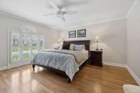 The primary bedroom is generously sized, featuring rich hardwood floors and large windows that allow natural light to pour in. 2640 Chesterfield Ct. Murfreesboro, TN 37129