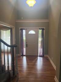 Foyer with soaring ceilings