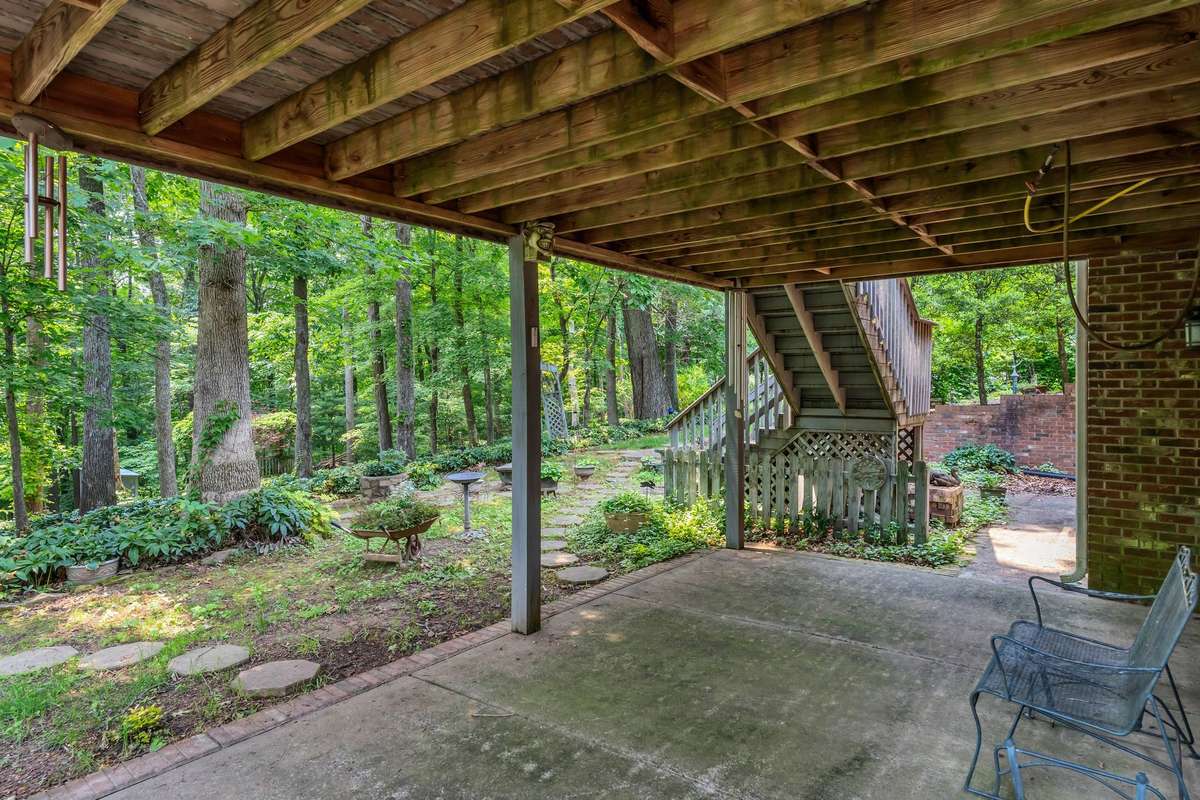 PATIO SPACE ON LOWER LEVEL, ENJOY THE BEAUTIFUL GARDEN AREA