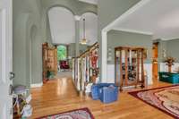 WELL MAINTAINED HARDWOOD FLOORS AND SOARING CEILINGS WELCOME YOU AS YOU ENTER.  PLEASE NOTE: SELLER IS HAVING A MOVING SALE JUNE 19TH-21ST, PLEASE PARDON WHILE SALE IS BEING PREPARED FOR.