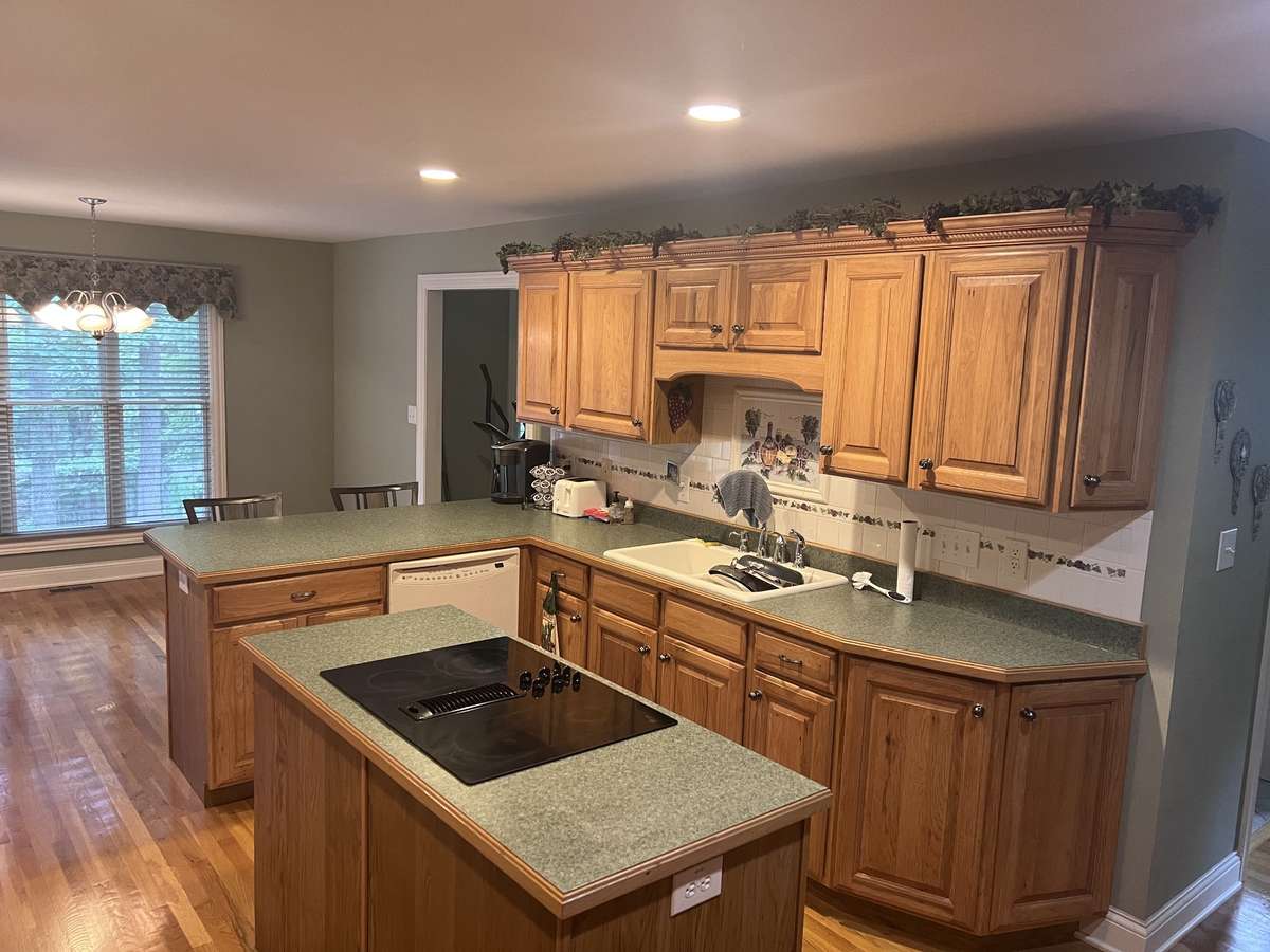 kitchen with island and plenty of cabinet storage