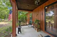 The covered front porch provides a welcoming entrance and a comfortable space to relax outdoors. 4835 Summertown Hwy Summertown, TN 38483