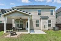 Fully fenced back yard with covered patio and extended patio! A quiet place to relax!