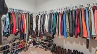 Master closet is the size of a bedroom! It's huge! Split with a wall in the middle, it creates spaces for each person to have their own side!