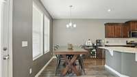 Spacious dining area will fit a table for 8!