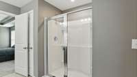 Master bath has double vanities, an extra-large shower, and a linen closet!