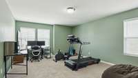 Large bonus room functions as the perfect movie/game room or workout room!
