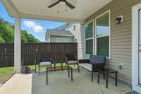 Fully fenced back yard with covered patio and extended patio! A quiet place to relax!