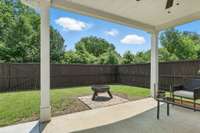 Fully fenced back yard with covered patio and extended patio! A quiet place to relax!