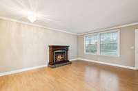 The den area offers a cozy electric fireplace that serves as a focal point! 101 Bane Dr.  Smyrna, TN 37167