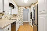 The kitchen offers an abundance of cabinet space and open shelving, providing plenty of storage and organization options! 101 Bane Dr.  Smyrna, TN 37167
