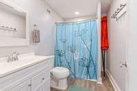 FULL Bathroom on the lower level for super easy access after a long day out on the TN River!