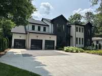 Third bay of garage shown on the left
