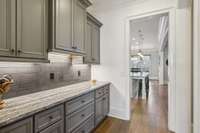 The Large Butler's Pantry Between the Kitchen and Dining Room Makes for a Handy Serving Area.