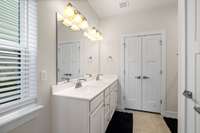 Double Vanity Sinks with walk-in shower