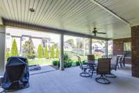 Lots of entertaining can be done on this huge covered back porch/patio!