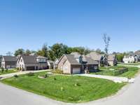 This Craftsman style home is a beautiful corner lot in the great new neighborhood of Madison Cove! A cul-de-sac off of the driveway will provide a good bike riding area for young ones!