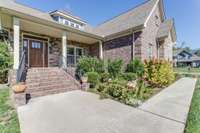 Beautiful and established landscaping welcome you to the front door of this home!