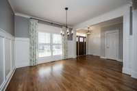 Lots of light flows through these large windows. Custom wordwork throughout.