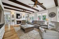 Living room that is wide open to the kitchen and multiple sitting areas