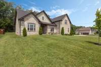 .32 Acres of All-Brick Home Located in a Corner Lot.