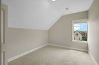 Secondary Room#4, which has a window that leads to the front road.