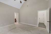 The door on the right goes to the utility room and kitchen. The door on the left goes to the master bedroom.