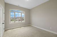 Secondary Room #2 is also on the first floor, right behind the family room.