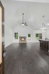 Open Floor Plan with Gas-Chimney and hardwood floors.