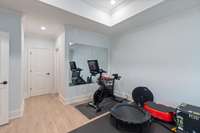 Designed for wellness and convenience, the home gym area accommodates a variety of workout equipment and routines.