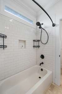 This well-appointed Jack and Jill bathroom offers dual entrances and ample space, ideal for shared use without sacrificing privacy.