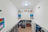 The versatile craft room is ideal for artists, crafters, or anyone looking for a dedicated creative space.