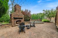 Experience the best of outdoor living with a fully appointed kitchen, comfortable seating areas, and a private spa for relaxation.