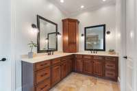Designed for ease and functionality, the bathroom includes a generous double vanity that accommodates comfortably.