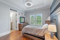 The spacious second bedroom features a private bathroom, offering comfort and convenience for guests or family members.