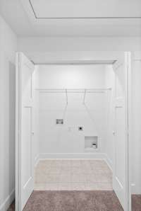 Laundry room in upstairs hallway