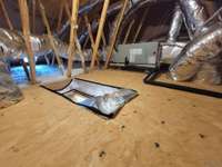 Extra space in the attic for storing your lighter things with electric plug and light