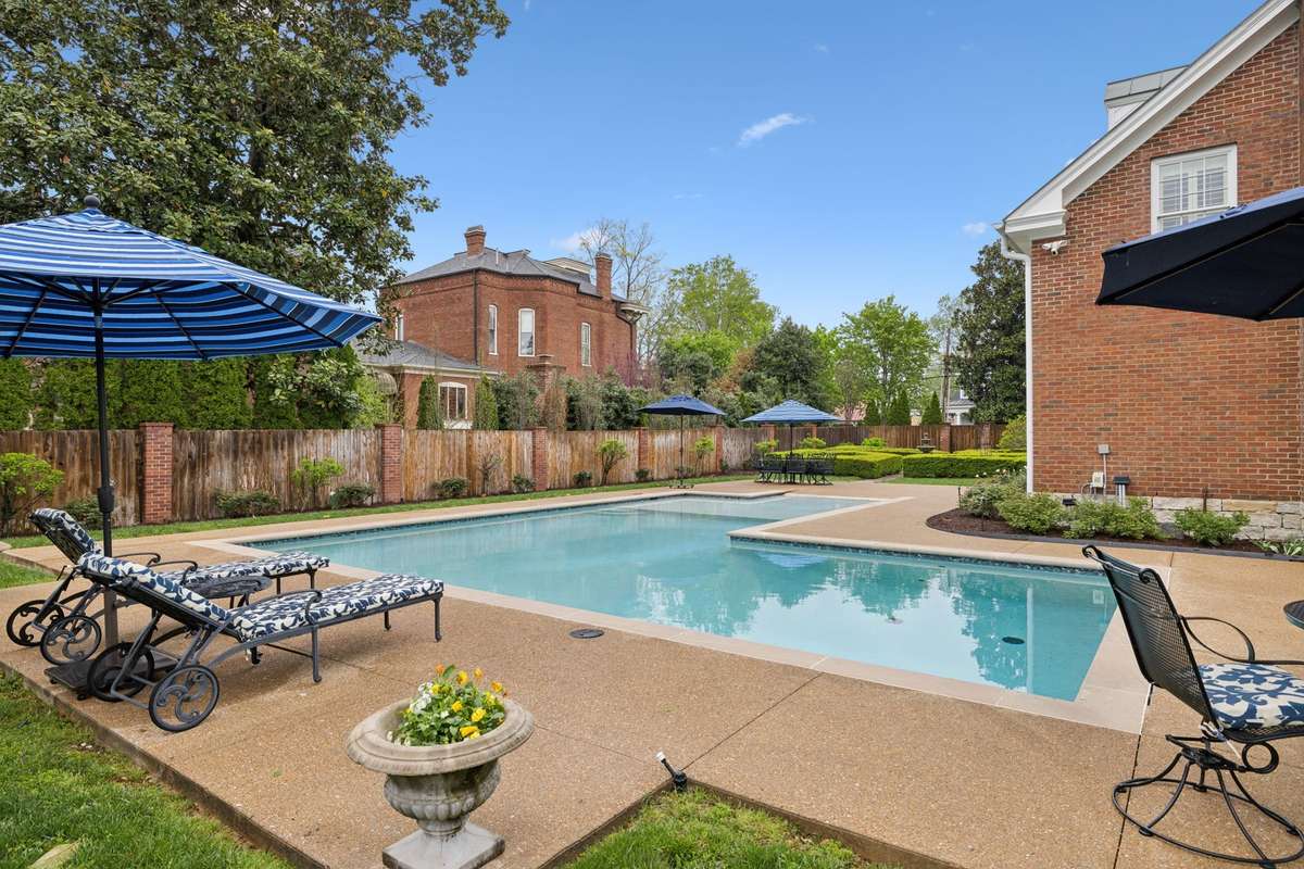 Custom pool by Waterscape Pool Company.  Zero entry with a place for lounge chairs