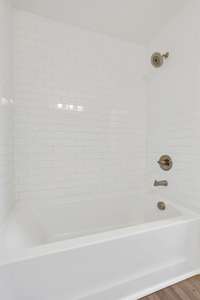 Beautifully-tiled shower-tub combo