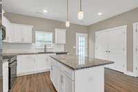 Bright white design w/ample cabinet space