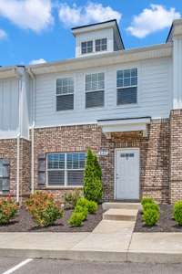 Brick + siding exteriors, landscaping