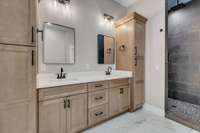 Master bathroom with custom tile walk in shower.